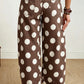Back view of brown white polka dot jeans with elastic back waistband and rear pockets